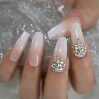 Diamond french tip nails are the new spring nail trend
